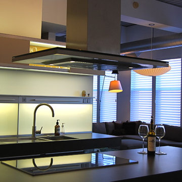 Modern Poggenpohl PLUSMODO kitchen with induction cooktop