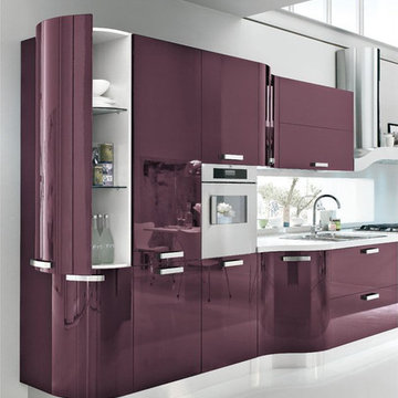 Modern purple kitchen with curved cabinets