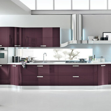 Modern purple kitchen with curved cabinets