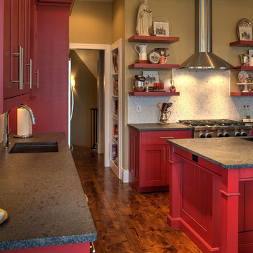 Modern shaker cabinetry with red paint and glaze finish.