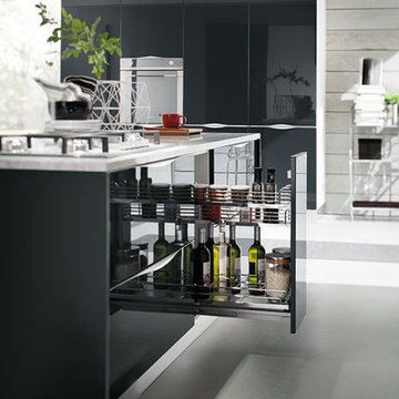 Modern white gloss kitchen with black island