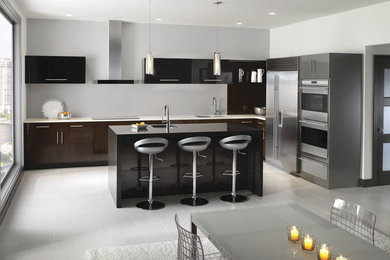 Example of a large trendy single-wall porcelain tile and gray floor eat-in kitchen design in Other with an undermount sink, flat-panel cabinets, brown cabinets, quartz countertops, stainless steel appliances and an island