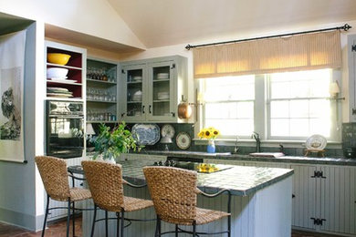 Example of a mountain style brick floor kitchen design in New Orleans