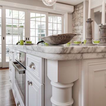 Mont Blanc Quartzite & Silver Pearl Granite in a White Kitchen