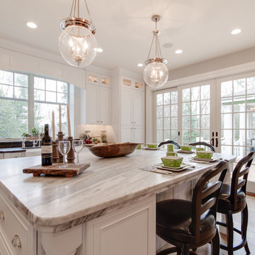 Mont Blanc Quartzite & Silver Pearl Granite in a White Kitchen