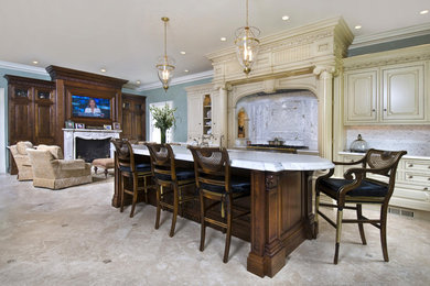 Inspiration for a large timeless single-wall marble floor and beige floor open concept kitchen remodel in Newark with raised-panel cabinets, beige cabinets, marble countertops, gray backsplash, marble backsplash, an island, an undermount sink and stainless steel appliances