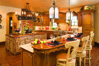 Tuscan kitchen photo in San Diego