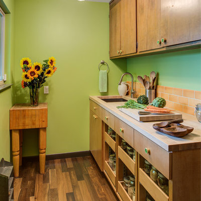 1950s single-wall medium tone wood floor kitchen pantry photo in San Francisco with an undermount sink, flat-panel cabinets, medium tone wood cabinets, orange backsplash, subway tile backsplash and wood countertops