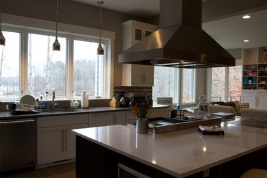 Example of a mid-sized trendy l-shaped light wood floor and beige floor enclosed kitchen design in Richmond with a single-bowl sink, shaker cabinets, white cabinets, quartzite countertops, multicolored backsplash, matchstick tile backsplash, stainless steel appliances and an island