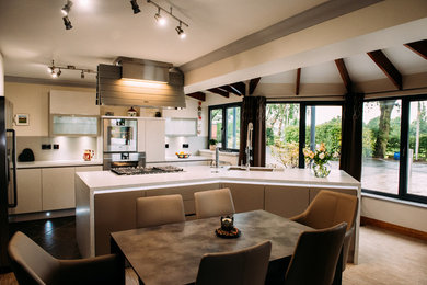 Inspiration for a large contemporary open plan kitchen in Manchester.