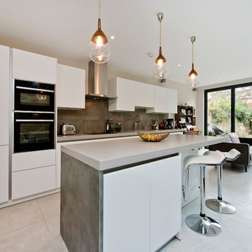 Mrs TB | White Modern Kitchen with Zinc Island Panel