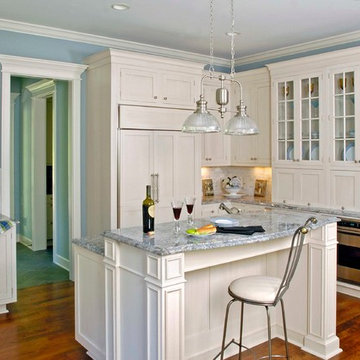 Multi Level White Cabinet Breakfast Island with Ice Blue Countertops