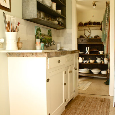 Kitchen - traditional kitchen idea in San Francisco with open cabinets