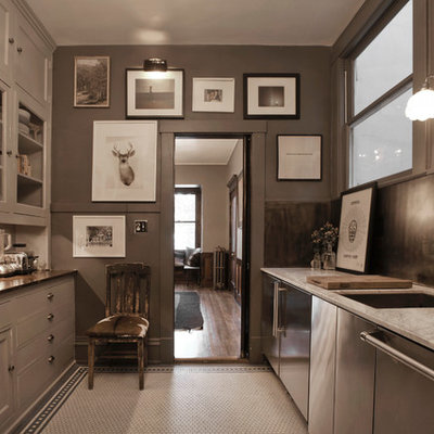Enclosed kitchen - contemporary u-shaped enclosed kitchen idea in Salt Lake City with an undermount sink, recessed-panel cabinets, gray cabinets and stainless steel appliances