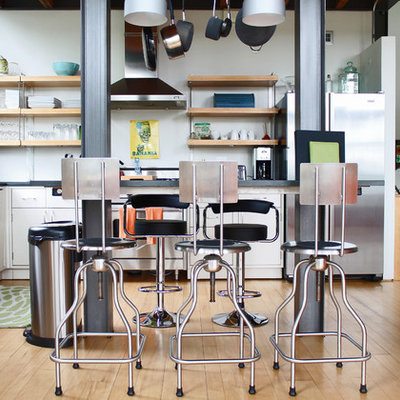 Trendy kitchen photo in Burlington with flat-panel cabinets