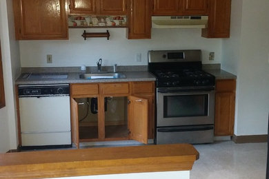 Example of a mid-sized classic kitchen design in New York