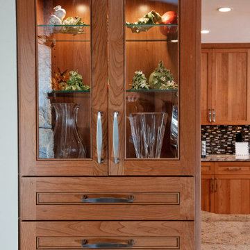 Natural Cherry Kitchen with Glass Doors in Great Falls, VA