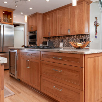 Natural Cherry Kitchen with Glass Doors in Great Falls, VA