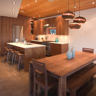 Contemporary eat-in kitchen ideas - Example of a trendy eat-in kitchen design in Seattle with an undermount sink, flat-panel cabinets and medium tone wood cabinets