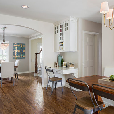 Eat-in kitchen - mid-sized transitional medium tone wood floor eat-in kitchen idea in Minneapolis with shaker cabinets, an island, white cabinets, quartzite countertops, a farmhouse sink, white backsplash and subway tile backsplash
