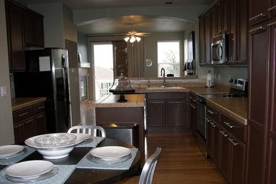 Example of a mid-sized transitional kitchen design in Omaha