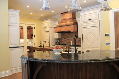 Inspiration for a large timeless kitchen remodel in Other with a farmhouse sink and two islands