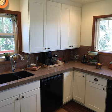New full sized upper cabinets with refaced base cabinets
