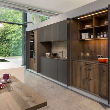 New "hidden kitchen" using bespoke Rempp kitchen furniture.