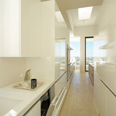 Example of a trendy galley enclosed kitchen design in Los Angeles