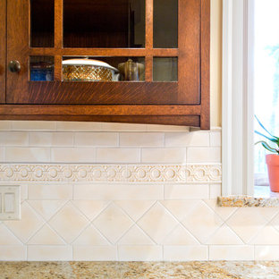 Large craftsman kitchen ideas - Inspiration for a large craftsman light wood floor kitchen remodel in Boston with an undermount sink, shaker cabinets, medium tone wood cabinets, granite countertops, white backsplash, porcelain backsplash, stainless steel appliances and an island