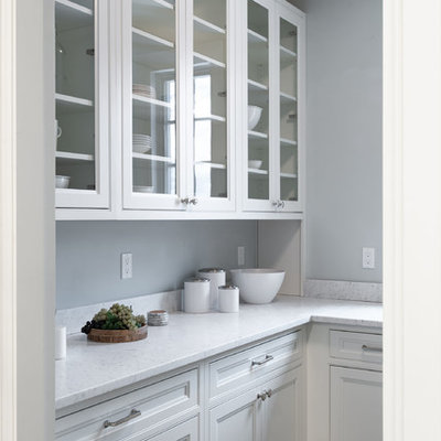 Eat-in kitchen - huge traditional l-shaped dark wood floor and brown floor eat-in kitchen idea in Boston with an undermount sink, beaded inset cabinets, white cabinets, marble countertops, gray backsplash, marble backsplash, stainless steel appliances, an island and white countertops