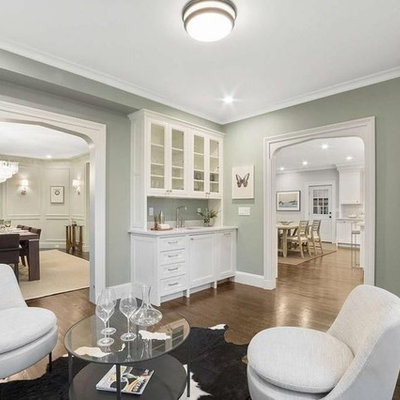 Huge elegant l-shaped dark wood floor and brown floor eat-in kitchen photo in Boston with an undermount sink, beaded inset cabinets, white cabinets, marble countertops, gray backsplash, marble backsplash, stainless steel appliances, an island and white countertops