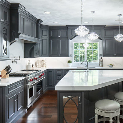 Large elegant l-shaped dark wood floor kitchen photo in Boston with an undermount sink, beaded inset cabinets, gray cabinets, quartz countertops, stainless steel appliances, an island, white countertops and white backsplash