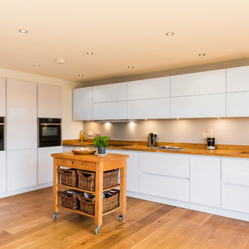Nobilia White High Gloss Kitchen with Solid wood worktop