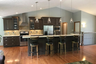 This is an example of a medium sized modern kitchen/diner in Cleveland.