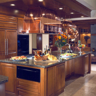 This is an example of a large traditional kitchen in Seattle with a drop-in sink, granite benchtops and ceramic floors.