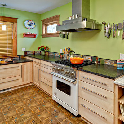 Inspiration for a small eclectic u-shaped linoleum floor eat-in kitchen remodel in Minneapolis with white appliances, an undermount sink, flat-panel cabinets, light wood cabinets, quartz countertops, multicolored backsplash, ceramic backsplash and no island