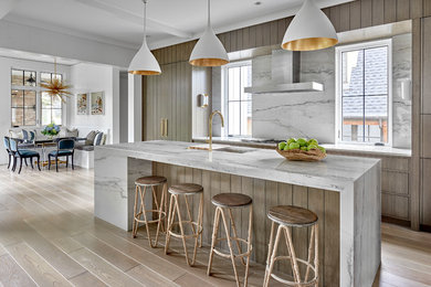 Eat-in kitchen - contemporary light wood floor and gray floor eat-in kitchen idea in Chicago with an undermount sink, flat-panel cabinets, quartzite countertops, white backsplash, paneled appliances, an island, white countertops and medium tone wood cabinets