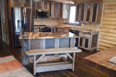 Eat-in kitchen - mid-sized rustic l-shaped dark wood floor and brown floor eat-in kitchen idea in Other with an undermount sink, shaker cabinets, medium tone wood cabinets, granite countertops, stainless steel appliances, an island and brown countertops