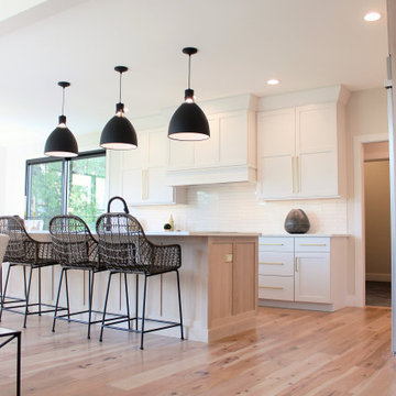 Oak, and White Kitchen with Matte Black Accents in Iowa Aspen Homes Farmhouse