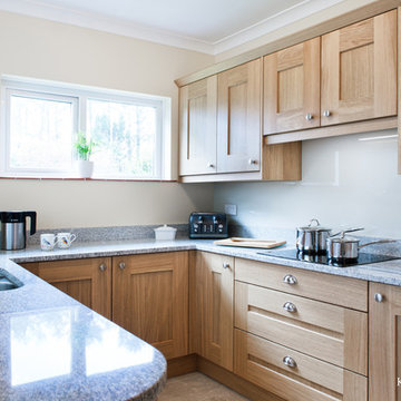 Oak shaker style kitchen with stunning deep grain granite worktop