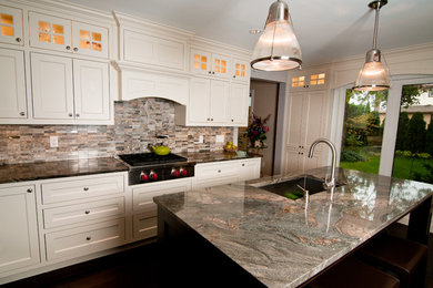 Trendy eat-in kitchen photo in Toronto with an undermount sink, recessed-panel cabinets, white cabinets, onyx countertops, multicolored backsplash, matchstick tile backsplash, stainless steel appliances and an island