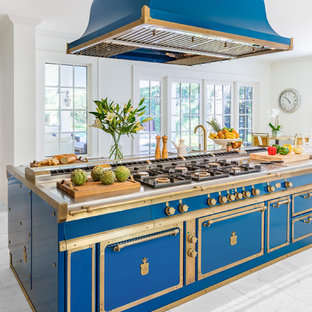 Inspiration for a large traditional eat-in kitchen in New York with an integrated sink, stainless steel benchtops, with island, stainless steel cabinets, blue splashback and blue benchtop.