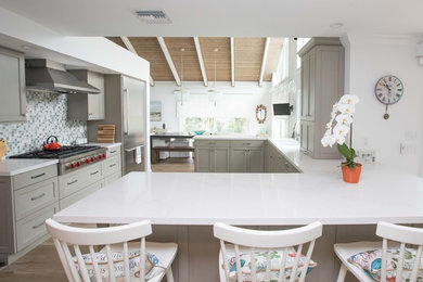 Beach style kitchen photo in Miami