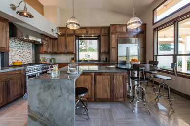 Inspiration for a large transitional l-shaped ceramic tile and gray floor open concept kitchen remodel in Other with an undermount sink, recessed-panel cabinets, dark wood cabinets, multicolored backsplash, mosaic tile backsplash, stainless steel appliances, granite countertops and an island