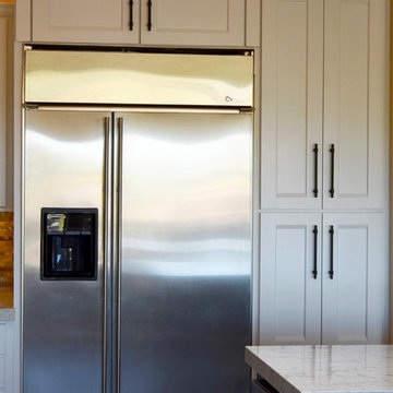 Offering more space by adding cabinets above the refrigerator