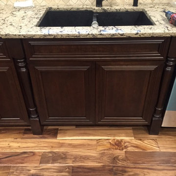 Omega Cabinets, Conklin door, Cherry wood, Chestnut stain.