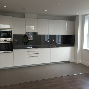 One-wall white gloss open plan kitchen