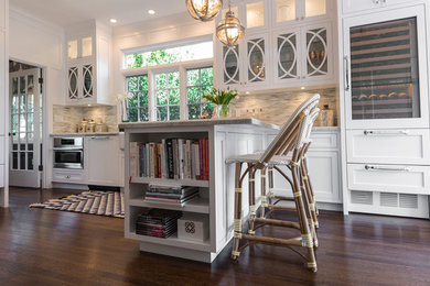Open and bright. Traditional lighting and cabinetry mix with modern conveniences