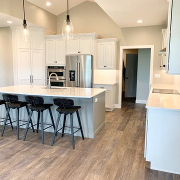 Open Concept Kitchen With Large Island in New Build by Hazelwood Homes (Geneseo,